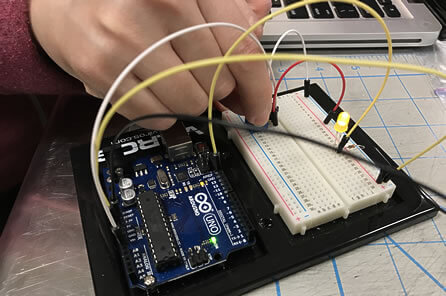 Person using an Arduino