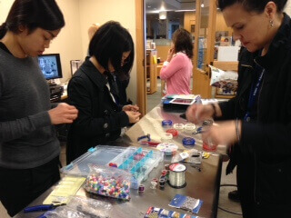 People making jewelry in Makers Lab