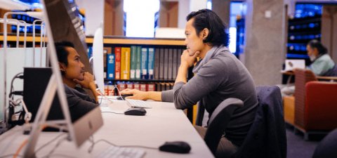 man conducting research