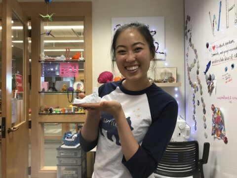 Cecilia holding a 3D printed foot