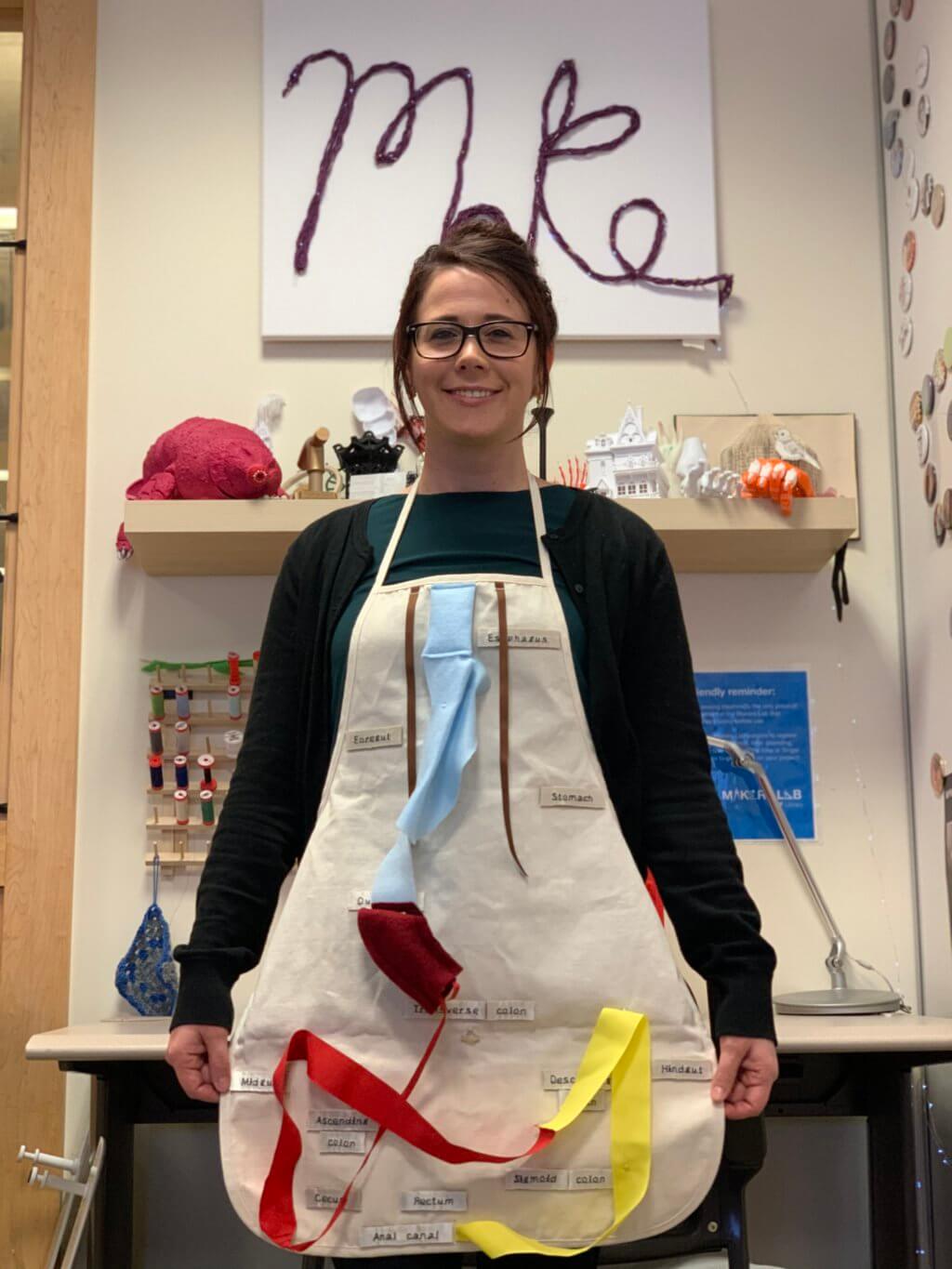 Dr. Klein wearing the finished apron