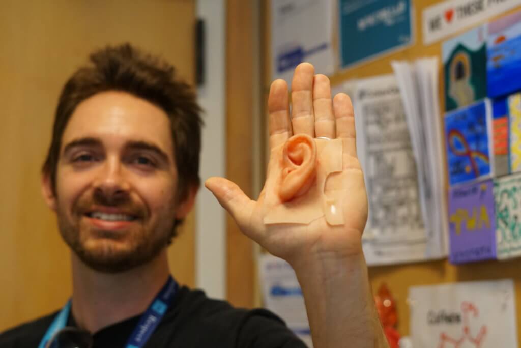 Scott Drapeau with 3D printed ear model