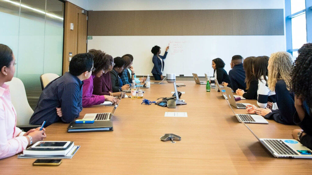 seminar room with professor and students