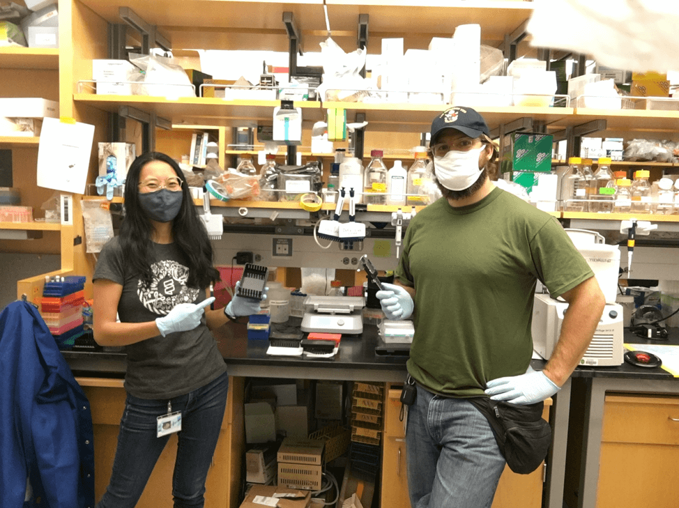 Gavin and lab mate in research lab