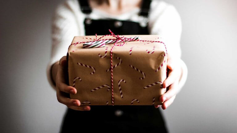 person presenting a package