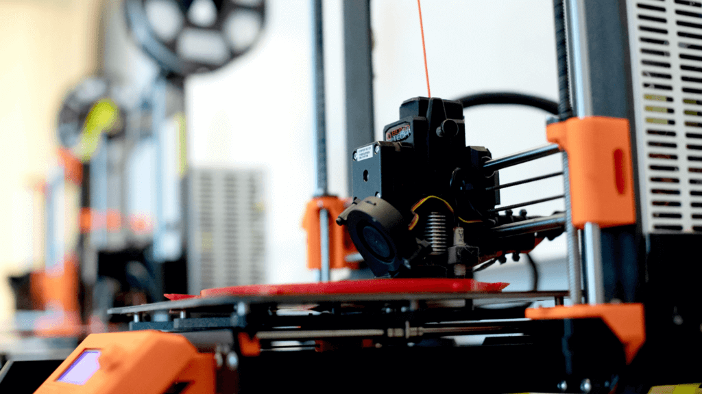 3D printer printing a model