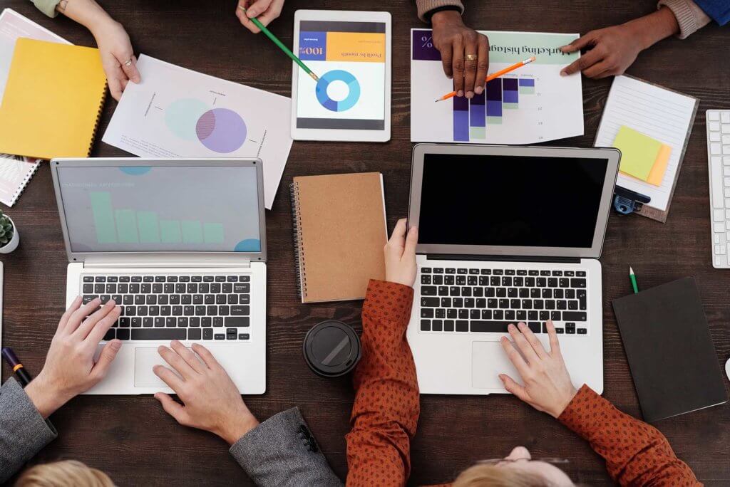 people working on laptop computers