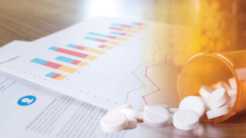 financial analytics blurry close up charts pills