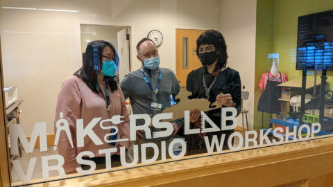 Three people working in the Makers Lab