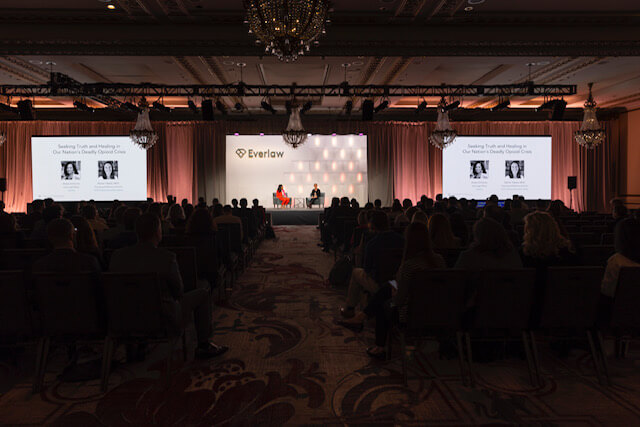 Everlaw Chief Legal Officer, Shana Simmons and UCSF IDL Processing and Reference Archivist, Rachel Taketa sit on stage during a fireside chat at the 2022 Everlaw Summit.