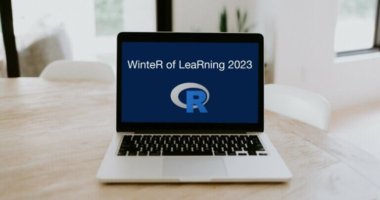Winter of Learning 2023 on a laptop screen with the R logo