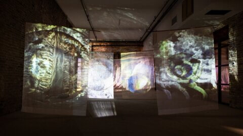 Projection mapping installation on large screens.
