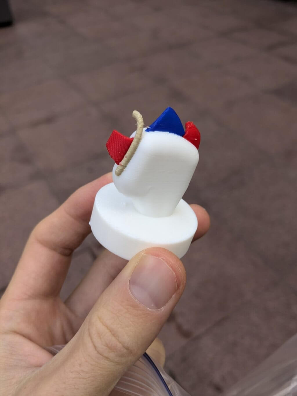 3D model of the rotator cuff demonstrating the anatomical relationship between the subscapularis insertion (red) on the humeral head (white) and biceps tendon (beige) and explains why subscapularis injuries are strongly associated with biceps tendon subluxation (slippage) out of the bicipital groove. The model also demonstrates the overlap between the posterior fibers of the supraspinatus tendon insertion (blue) and anterior fibers of the infraspinatus (red), a region prone to injury due to reduced vascularity.