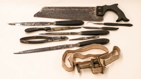 Amputation kit with bone saw and tourniquet, from UCSF Archives and Special Collections