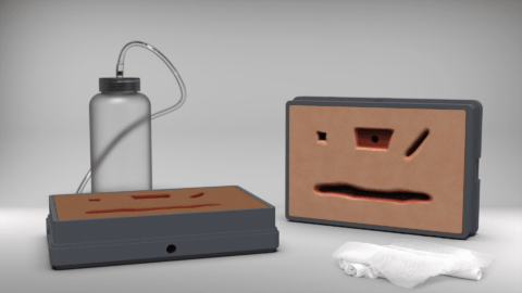 3D render of final design, including a clear bottle with tube, two rectangular boxes with silicone and wound-shaped patterns, and gauze