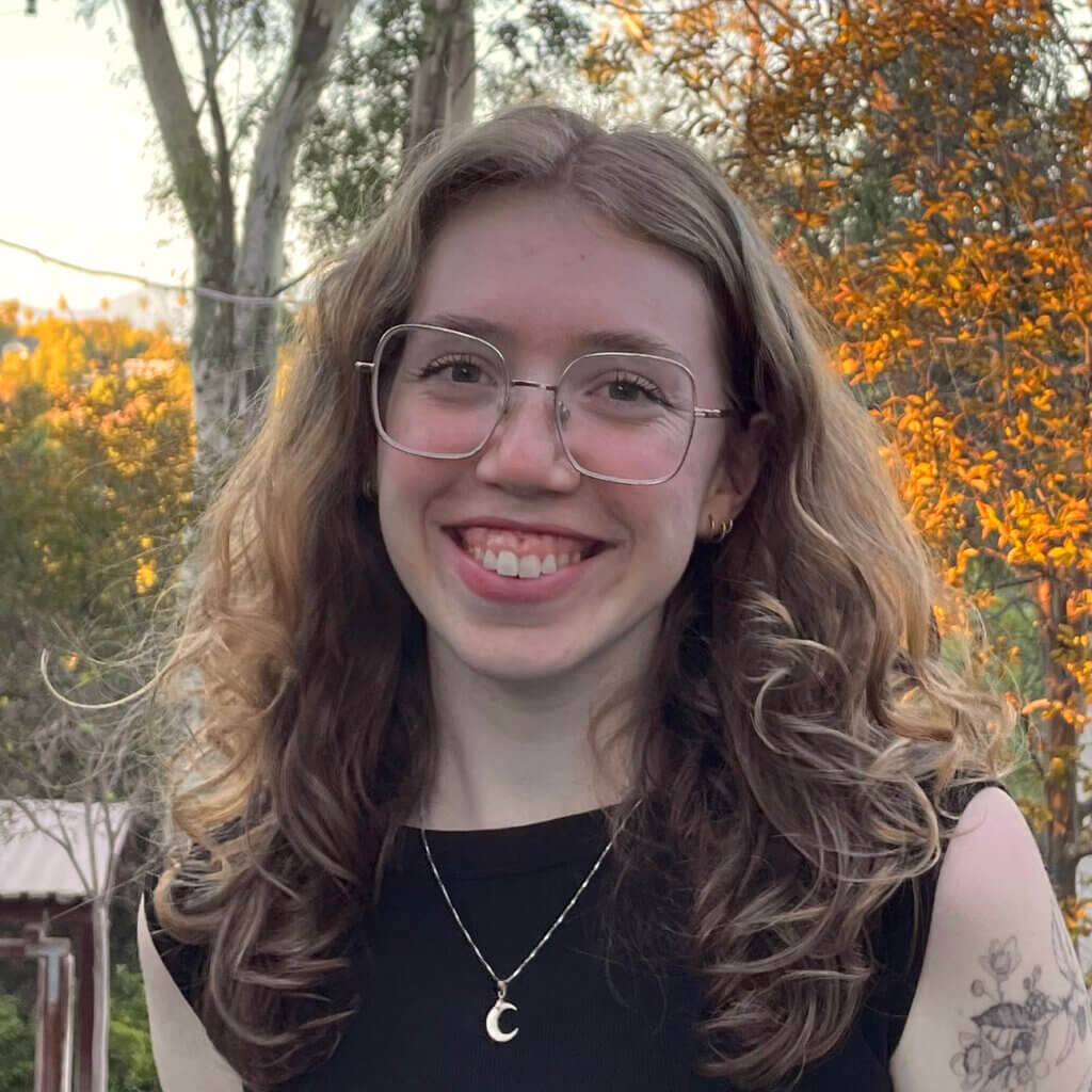 Hannah Herrick outdoors and smiling.